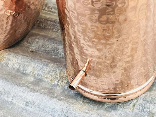 Hand-hammered copper alembic still used for distilling oregano oil at home