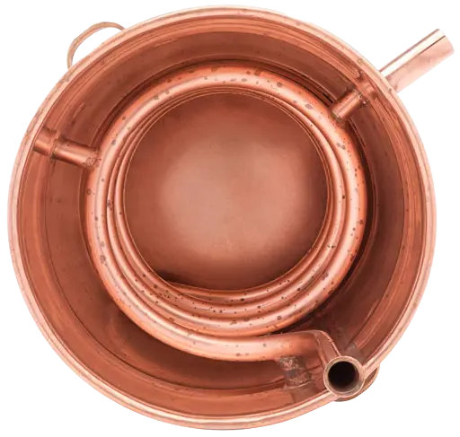 Traditional copper alembic still showing onion dome head and swan neck