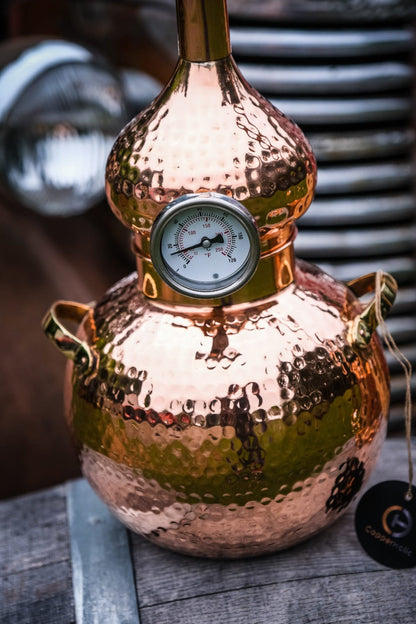 5-Litre Copper Alembic Still with hammered finish and temperature gauge, showing detailed craftsmanship and polished copper surface